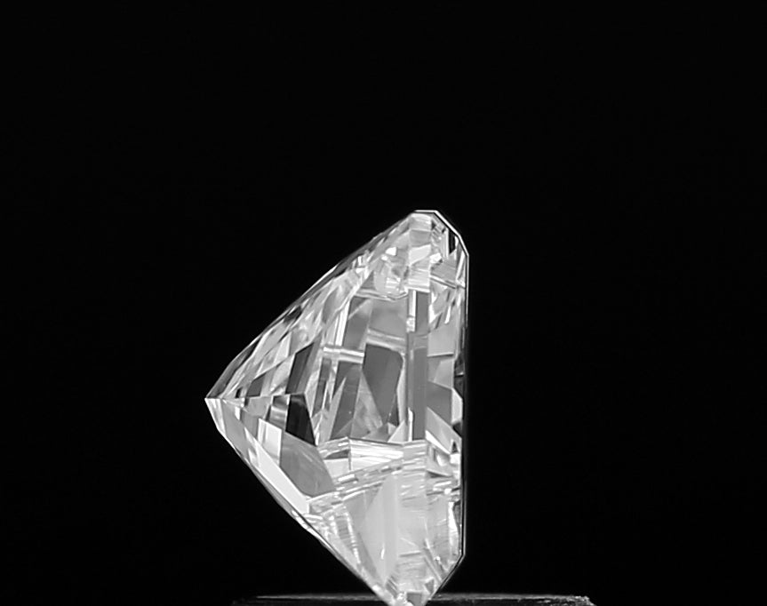 Exquisite lab grown Alphabet M shape cut diamond set in a bespoke jewelry piece, emphasizing its artistic appeal and modern elegance.