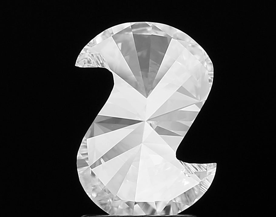 Macro shot highlighting the incredible fire and sparkle of a premium lab grown Alphabet S shape cut diamond, with precisely cut facets.