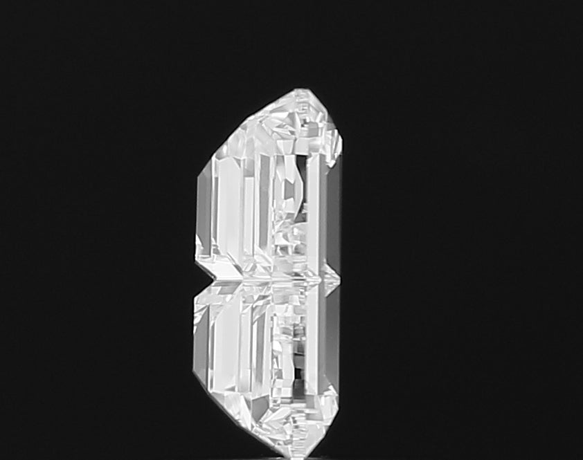 Authentic IGI certified lab grown Alphabet B shape cut diamond shown with its grading certificate, confirming its quality and ethical origin.