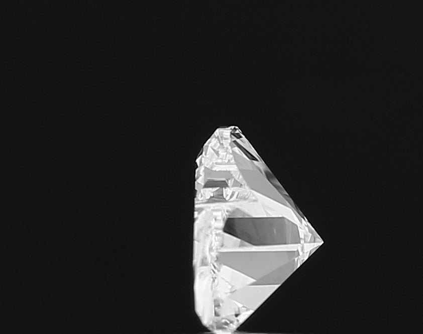 A mesmerizing close-up of a **Cloud Shape** lab grown diamond, showcasing its incredible inner fire, exceptional light play, and masterful cutting for ultimate sparkle.