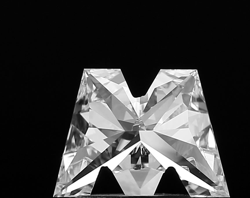 Stunning lab grown Alphabet M shape cut diamond, showcasing its unique and elegant silhouette with exceptional brilliance and intricate design.