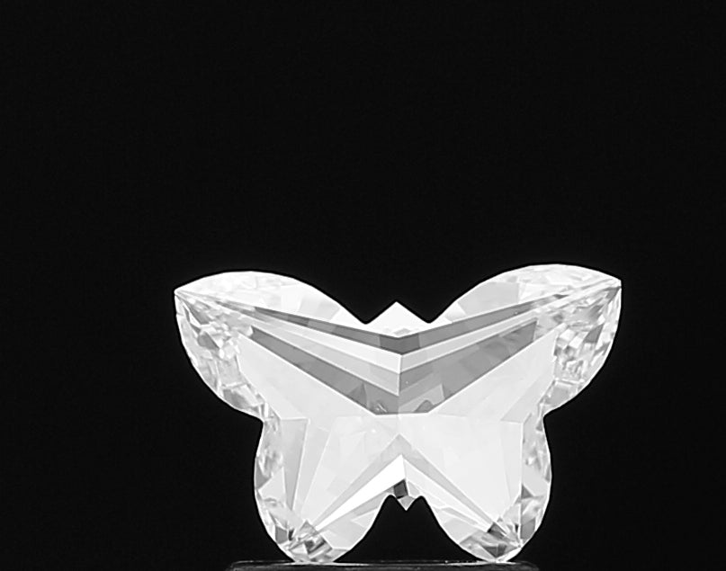 Discover the enchanting beauty of a lab grown **Butterfly Shape** cut diamond, precisely sculpted to reveal its graceful, symmetrical silhouette and brilliant facets.