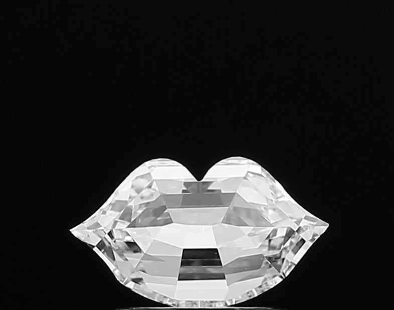 Discover the alluring beauty of a lab grown **Lip Shape** cut diamond, precisely sculpted to reveal its romantic, distinctive silhouette and captivating brilliance.