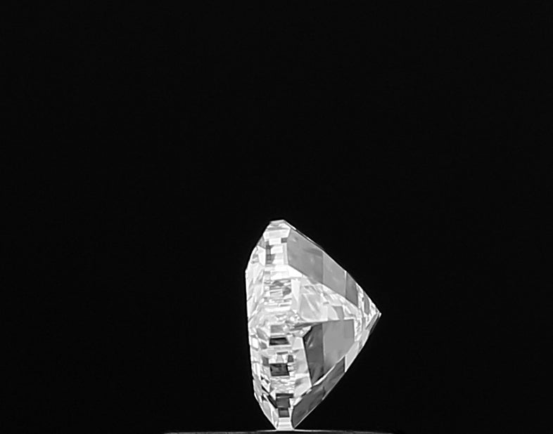A mesmerizing close-up of a **Lip Shape** lab grown diamond, showcasing its incredible inner fire, exceptional light play, and masterful cutting for ultimate sparkle.