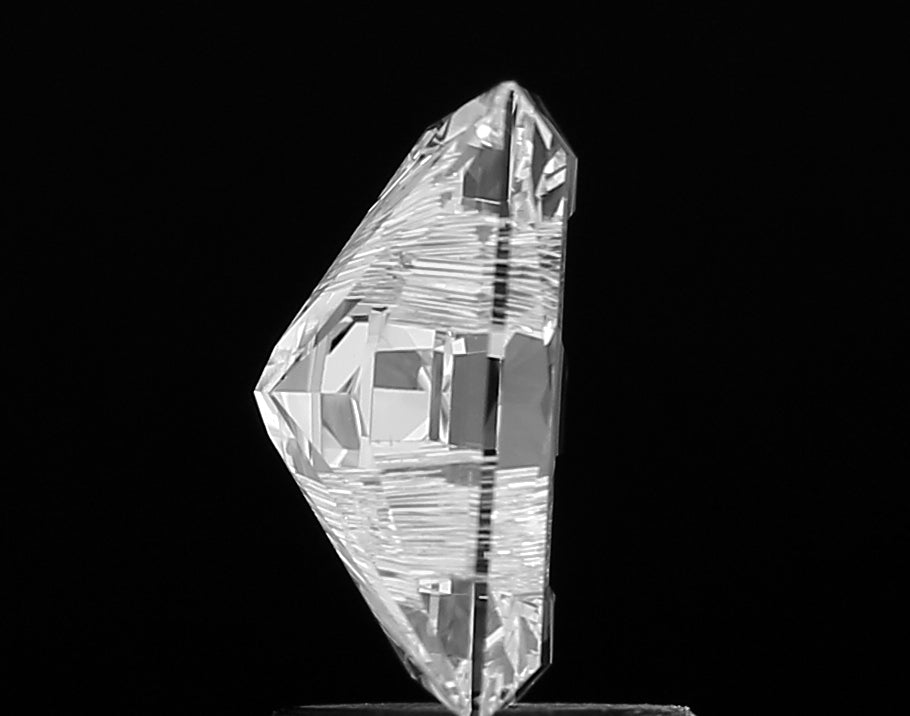 Exquisite lab grown Alphabet E shape cut diamond set in a bespoke jewelry piece, emphasizing its artistic appeal and modern elegance.