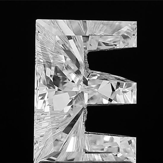 360-degree video showcase of a loose lab grown Alphabet E shape cut diamond, revealing its intricate design, full dimensions, and mesmerizing sparkle from every angle.